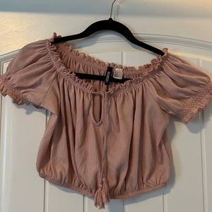 Divided Pink Tassel Crop Top